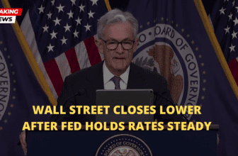 Wall Street Closes Lower After Fed Holds Rates Steady
