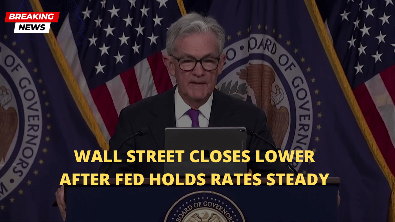 Wall Street Closes Lower After Fed Holds Rates Steady